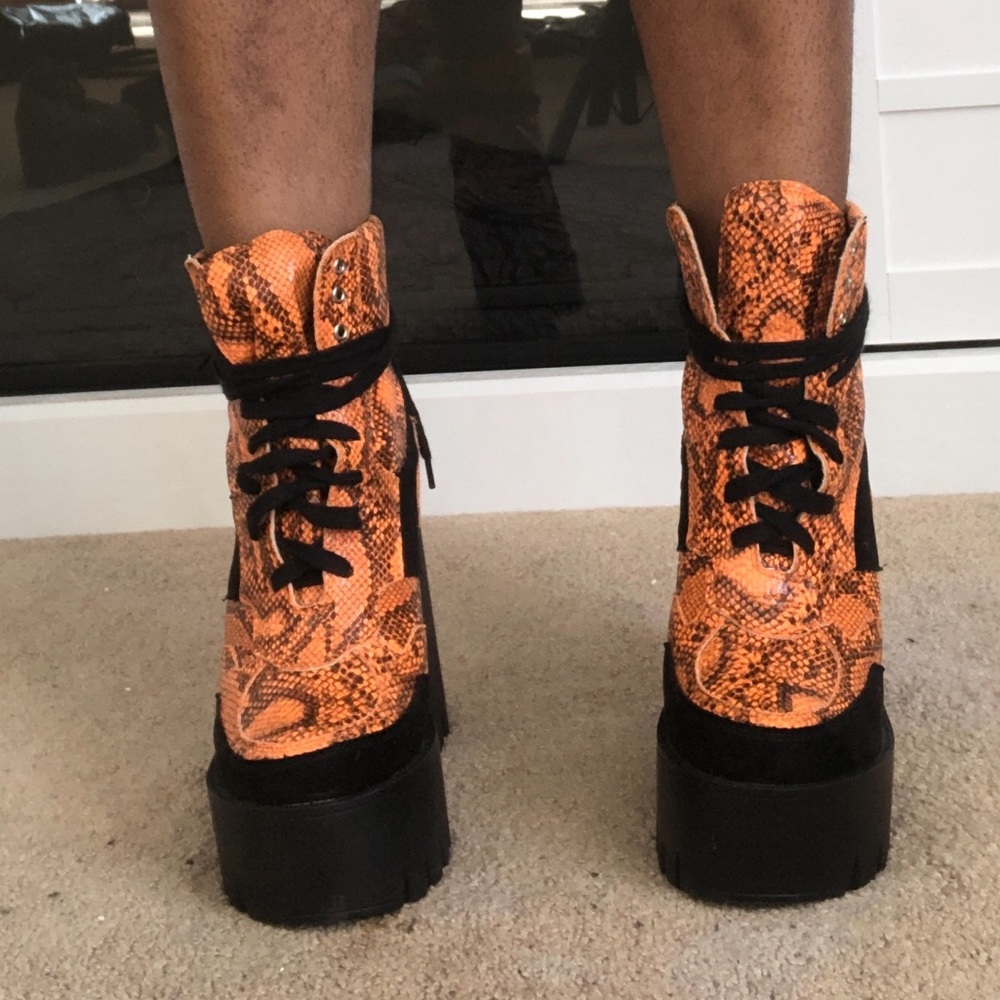 Neon orange snake skin and suede platform booties